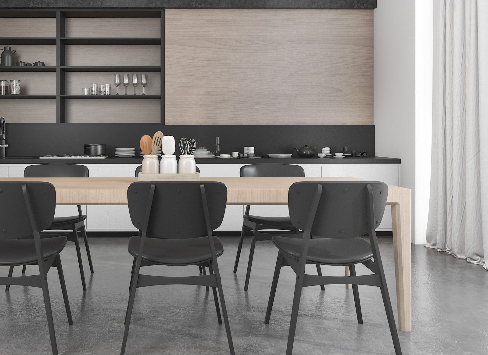 Open-plan kitchen with dark cabinetry and a timber dining table